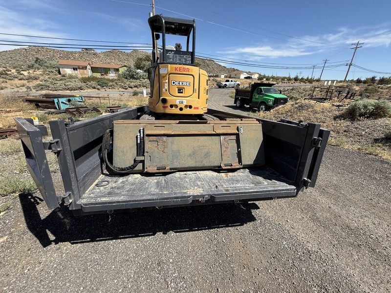 Errol Kerr operating a John Deere 35G mini excavator on a Sierra jobsite