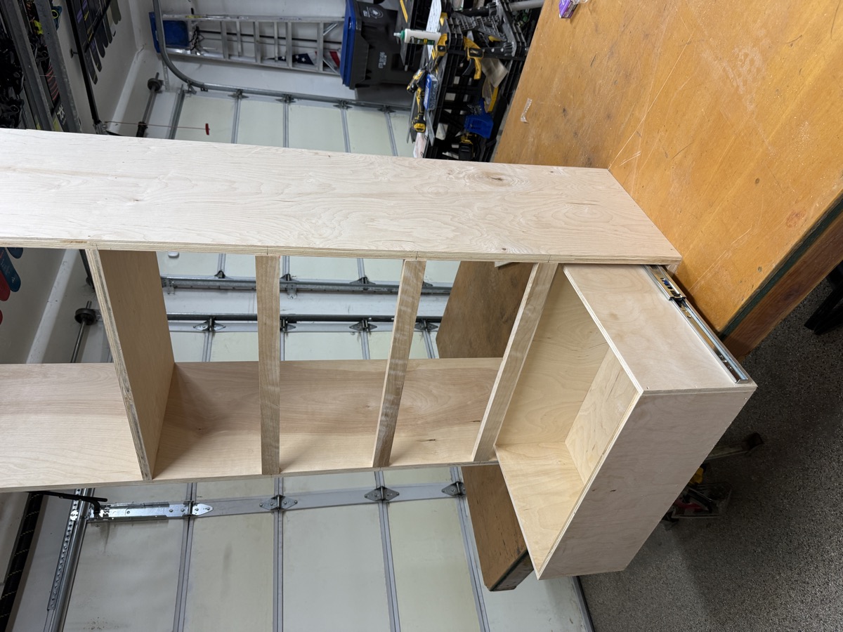 Completed shelving tower in the garage ready for install