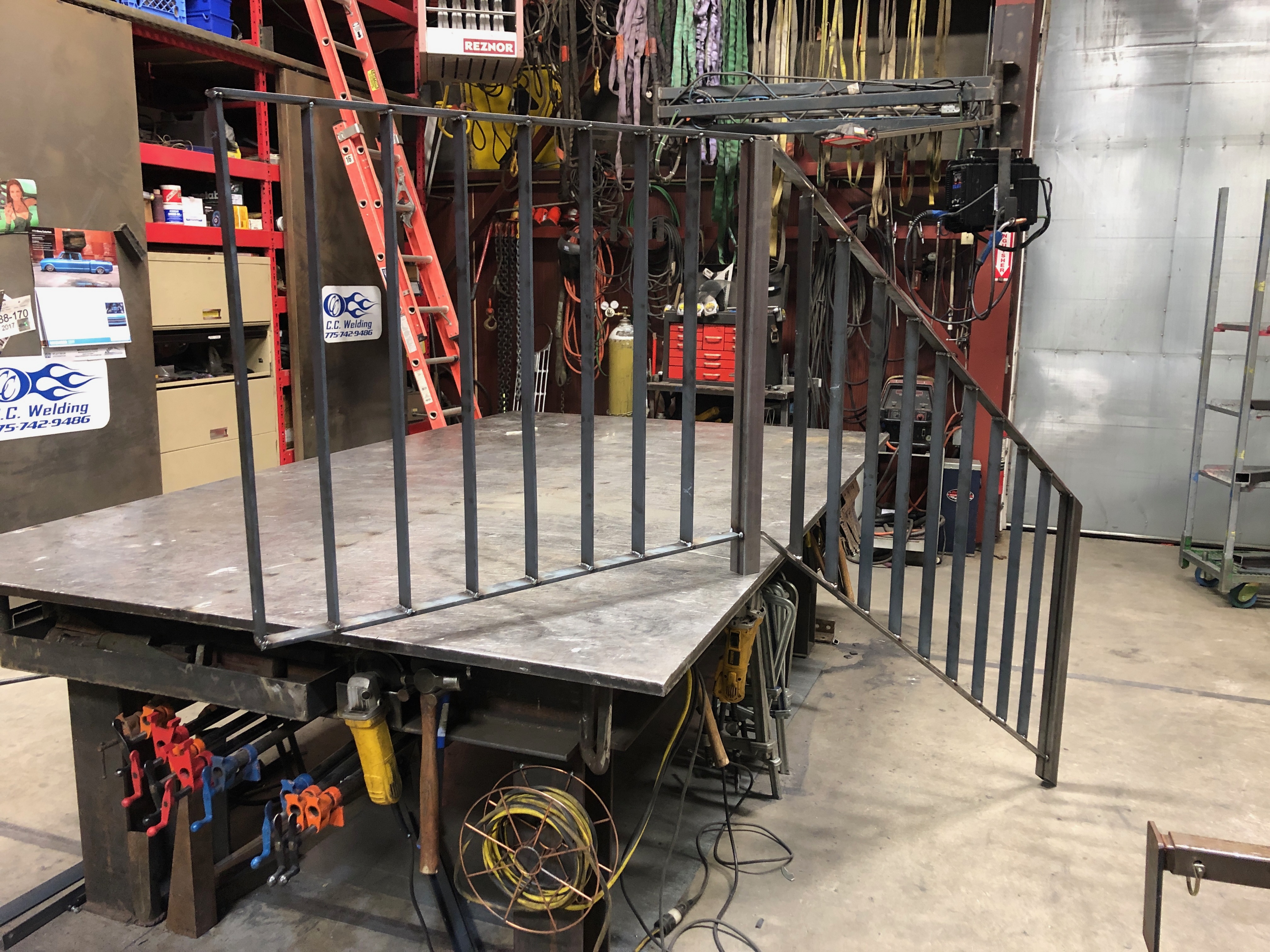 Large L-shaped railing with vertical balusters